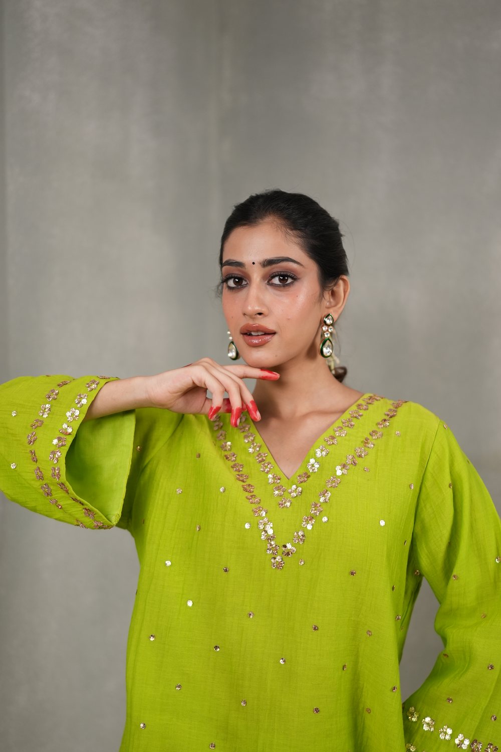 Firdaus Parrot Green Farshi suit — neckline portrait